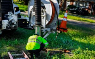 Expert technician performing routine stormwater maintenance to ensure the proper functioning and longevity of the water management system.