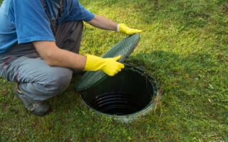 Opening,Septic,Tank,Lid.,Cleaning,And,Unblocking,Septic,System,And